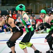 "Smashy" jamming for the Black Rock Bandits, and "Block n' Deck Her" trying to stop her.