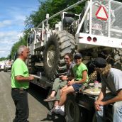 Penniac anti-shale gas protesters sit on a tow truck carrying a seismic vibrator truck. Photo: Tracy Glynn.